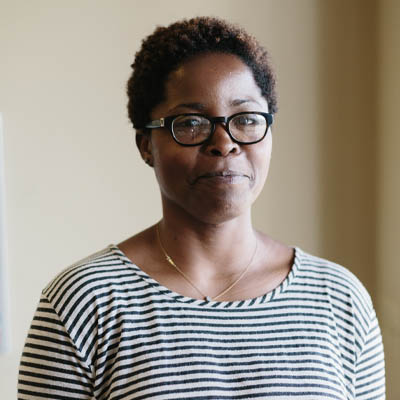 Nnenna Okpara sitting with kids